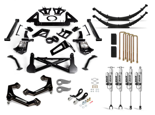 A collection of vehicle suspension components organized neatly, featuring leaf springs, shock absorbers, bolts, brackets, Ball Joint SM Series Upper Control Arms, Cognito parts, and crossmember components. Dominated by black and metallic finishes with select GM 2500/3500 lift kit elements carrying the Cognito Motorsports branding. Included is the Cognito 12-Inch Performance Lift Kit with Fox 2.0 PSRR Shocks specifically designed for the 2020-2024 Silverado/Sierra 2500/3500 2WD/4WD models.