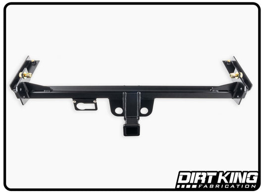 A black metal rear bumper hitch assembly with mounting brackets, designed specifically for the 2019-2024 GM 1500 trucks, enhances vehicle installation. The image features the "DIRT KING" logo in the bottom right corner. This "19-24 GM 1500 Hitch for Plate Bumper" ensures optimal ground clearance for rugged terrains.
