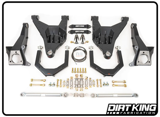 An array of black suspension components and hardware laid out neatly on a white background. The components, part of the DIRT KING 99-06 GM 1500 Race Long Travel Kit, include control arms, bolts, nuts, washers, spacers, and rods. The "DIRT KING Fabrication" logo is visible in the bottom right corner.